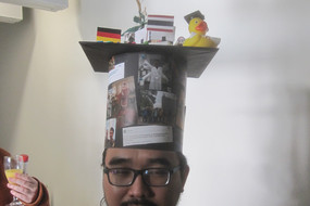 Thanet Pitakbut and his PhD hat