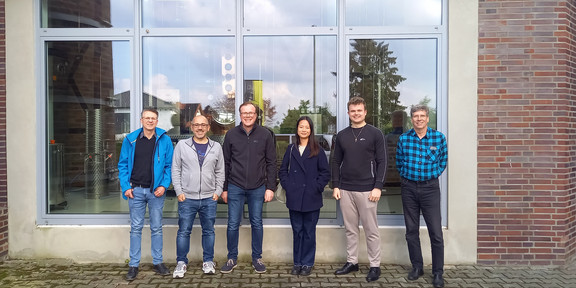 The participants of the excursion in front of the distillery