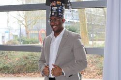 Kilan Schäfer with his doctoral hat from Frankfurt
